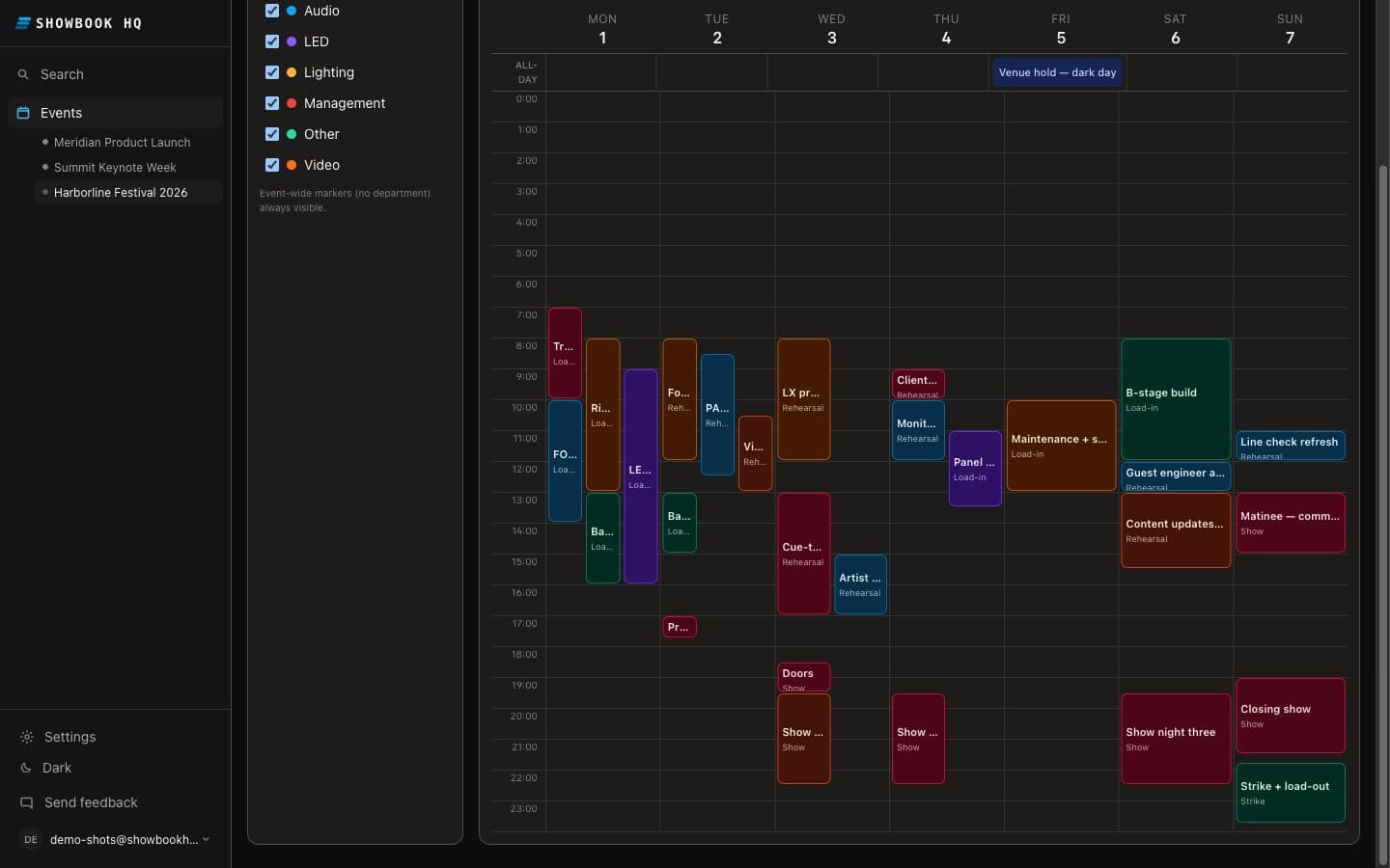 The week schedule: color-coded department calls for load-in, focus, cue-to-cue, doors, show nights, and strike across seven days.